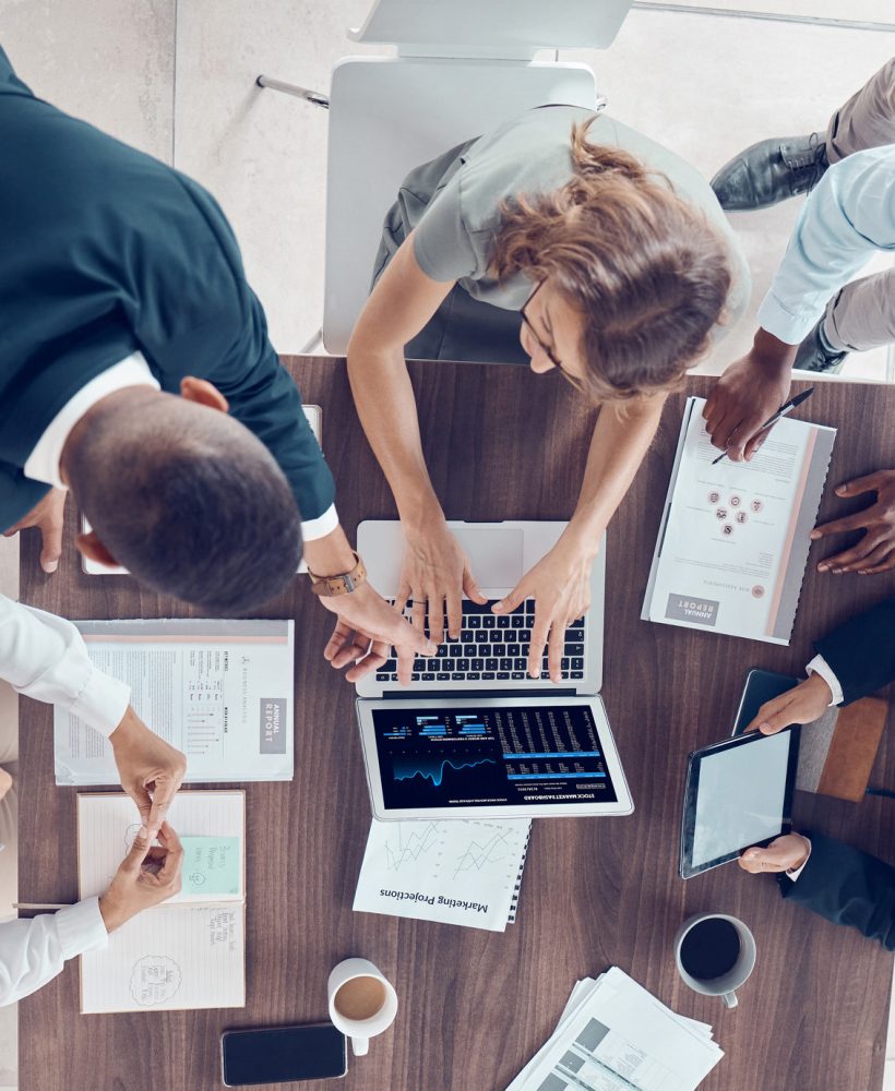 Planning, project management and marketing with business people in meeting for research, strategy and goals with laptop. Growth, analytics and collaboration with employees in corporate office